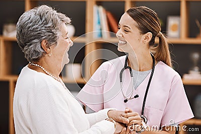 Healthcare, insurance and a senior woman patient and nurse consulting during a checkup in a retirement home. Medical Stock Photo