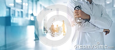 Medicine doctor with stethoscope in hand, confidently standing Stock Photo