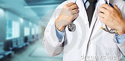 Healthcare and Medicine concept. Unrecognizable Male Doctor Holds Hands On Stethoscope Stock Photo