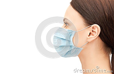 Profile of young woman wearing medical mask Stock Photo