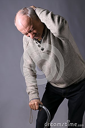 Healthcare, pain, stress and age concept. Sick old man. Senior man suffering from headache Stock Photo