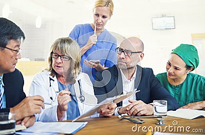 Healthcare Workers Having a Meeting Stock Photo