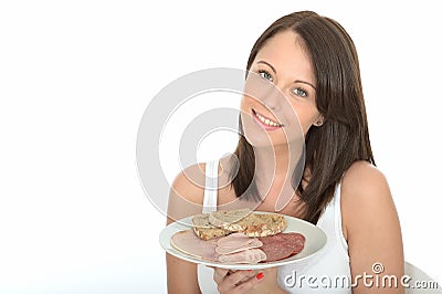 Healthy Attractive Natural Happy Young Woman Holding a Typical Norwegian Style Cold Buffet Stock Photo
