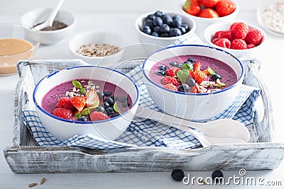 Healthy berry smoothie bowl with strawberry blueberry raspberry Stock Photo