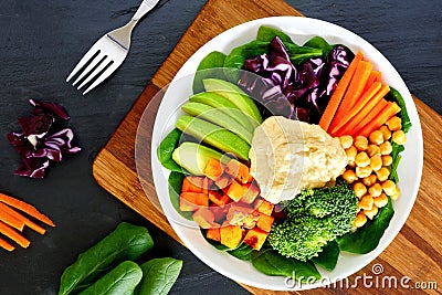 Healthy bowl with super-foods on slate background Stock Photo