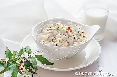 Healthy breakfast with boiled job`s tears porridge in white bowl Stock Photo