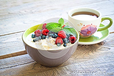 Healthy breakfast - oatmeal with berries Stock Photo