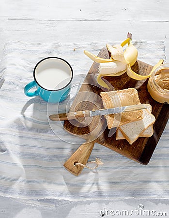 Healthy breakfast. Sandwiches peanut butter, banana, milk top vi Stock Photo