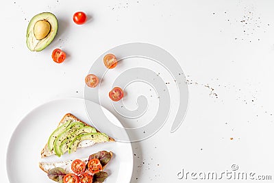 Healthy breakfast with sandwiches set on plate on white background top view mockup Stock Photo