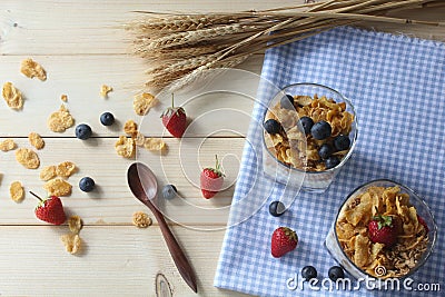 Healthy breakfast. Whole grain cereal with fresh blueberries and strawberries. Stock Photo