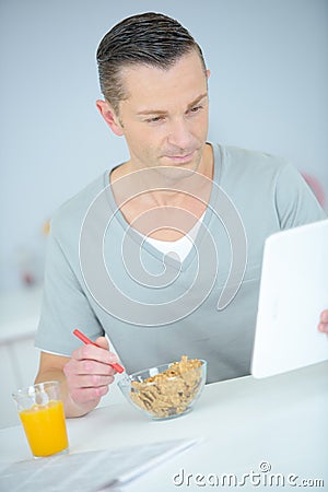 Healthy businessman having breakfast Stock Photo
