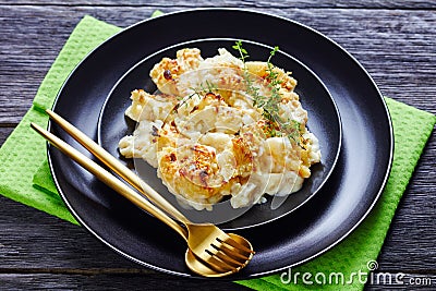 Healthy casserole cauliflower cheese on a plate Stock Photo