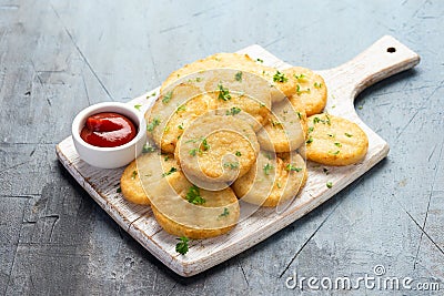 Healthy Cauliflower hash browns on white wooden board Stock Photo