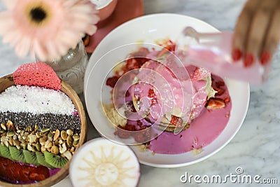 Healthy colorful breakfast. pink and green tones. Stock Photo