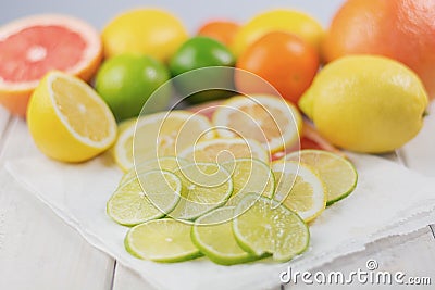Healthy composition of lemon, lime, grapefruit and tangerine. Stock Photo