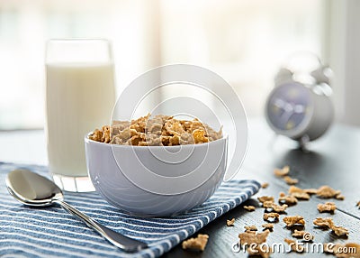 Healthy Corn Flakes with milk for Breakfast on table Stock Photo