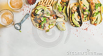 Healthy corn tortillas with grilled chicken, avocado, lime, beer Stock Photo