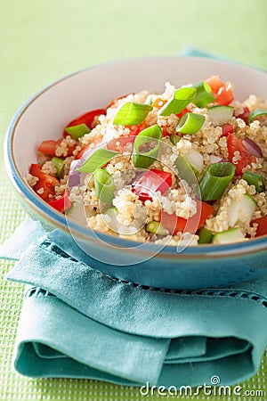 Healthy couscous salad with tomato cucumber onion chives Stock Photo