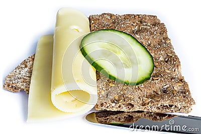 The Healthy Crispbread, Sereal Bread With Cheese, Cucumber And Knife Stock Photo