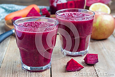 Healthy detox beetroot, carrot, apple and lemon juice smoothie, horizontal Stock Photo