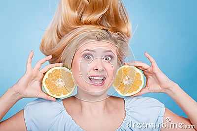 Woman holding fruit green grapefruit Stock Photo