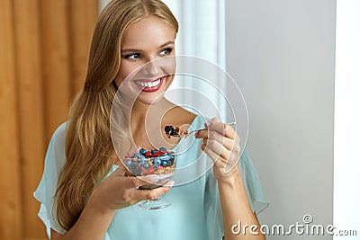 Healthy Diet. Woman Eating Cereal, Berries In Morning. Nutrition Stock Photo