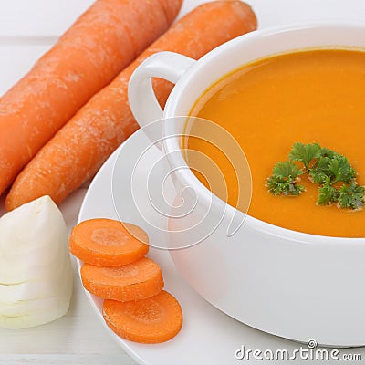 Healthy eating carrot soup with carrots in cup Stock Photo