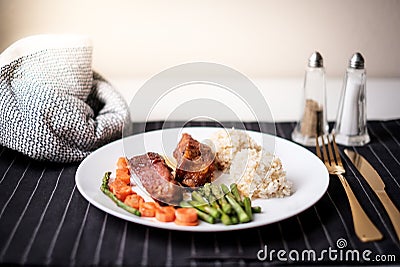 Healthy eating . diet food dinner dish. pork ribs and green bean, carrot , quinoa Stock Photo