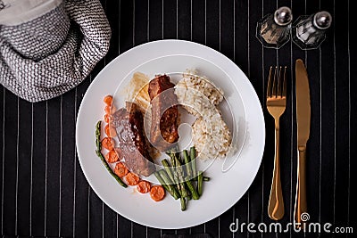 Healthy eating . diet food dinner dish. pork ribs and green bean, carrot , quinoa Stock Photo