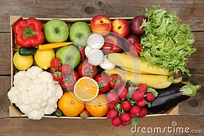 Healthy eating fruits and vegetables in box from above Stock Photo