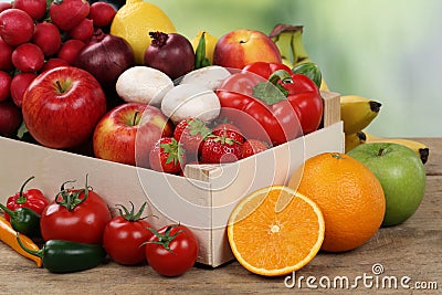 Healthy eating fruits and vegetables in box Stock Photo