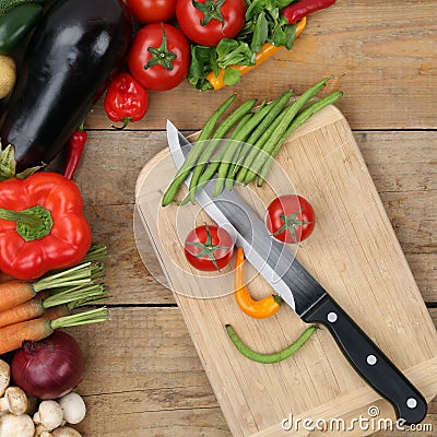 Healthy eating preparing food smiling vegetables face Stock Photo
