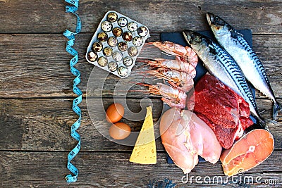 Healthy food of animal origin on old wooden background. Concept of proper nutrition. Stock Photo