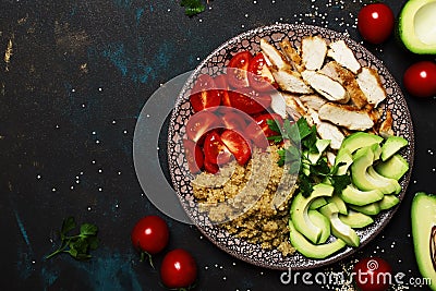 Healthy food, avocado, quinoa, chicken and tomatoes on plate, to Stock Photo