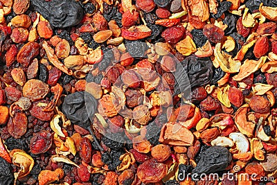 Healthy food. Background of dried fruit. A mixture of dried apricots, pears, raisins, apples, prunes Stock Photo