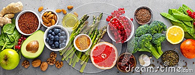 Healthy food background with fresh salmon fish, vegetables, berries and nuts. Top view. Banner Stock Photo