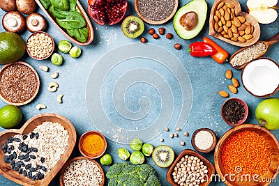 Healthy food background from fruits, vegetables, cereal, nuts and superfood. Dietary and balanced vegetarian eating products Stock Photo