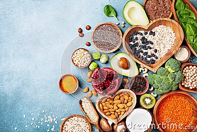 Healthy food background from fruits, vegetables, cereal, nuts and superfood. Dietary and balanced vegetarian eating products Stock Photo