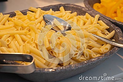 Healthy food buffet in restaurant. Cooked macaroni bowl. Stock Photo