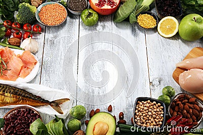 Healthy food clean eating selection. fruit, vegetable, seeds, superfood, cereals, leaf vegetable on rustic background Stock Photo