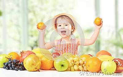 Healthy food. happy child girl and a fruit Stock Photo