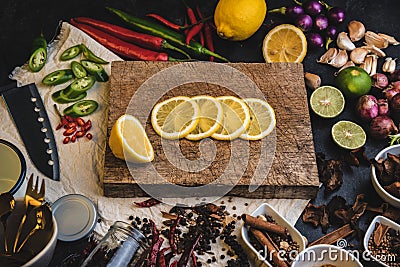 Healthy food herbs. Spices for use as cooking ingredients on a wooden table with Fresh organic vegetables and raw material with Stock Photo