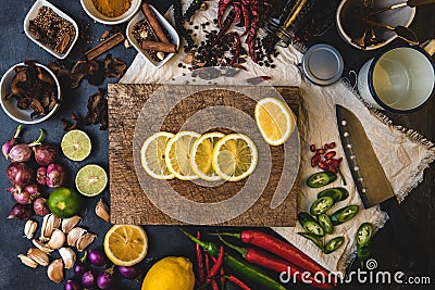 Healthy food herbs. Spices for use as cooking ingredients on a wooden table with Fresh organic vegetables and raw material with Stock Photo