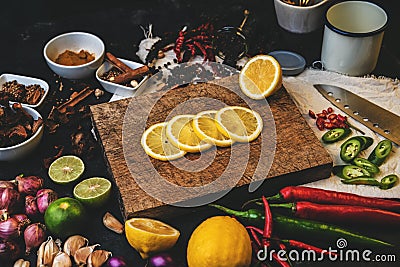 Healthy food herbs. Spices for use as cooking ingredients on a wooden table with Fresh organic vegetables and raw material with Stock Photo