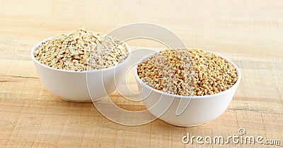 Healthy Food Oats and Steel-cut Oats in Bowls Stock Photo