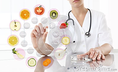 Healthy food supplements concept, Hand of nutritionist doctor Stock Photo