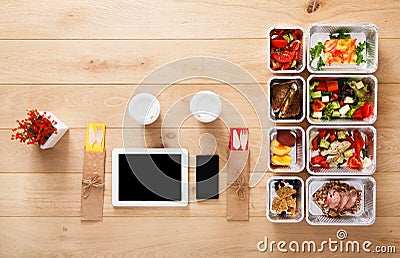 Healthy food take away in boxes, top view at wood Stock Photo