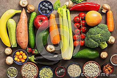 Healthy food for vegan and vegetarian nutrition. The concept of clean eating diet. A variety of vegetables, fruits, legumes, Stock Photo