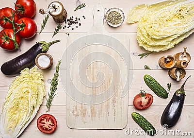 Healthy foods, cooking and vegetarian concept different vegetables and ingredients for the salad, lined around white cutting b Stock Photo