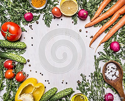 Healthy foods, cooking and vegetarian concept fresh carrots with cherry tomatoes, garlic, lemon radish, peppers, cucumbers, butter Stock Photo